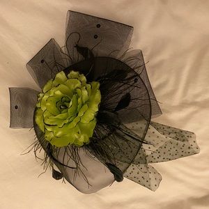 Green flower fascinator on a headband